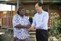 Annie Ngalmirama, greets former Japanese prime minister Naoto Kan