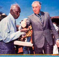 To symbolise the granting of a pastoral lease of traditional Gurundji country, Prime Minister Gough Whitlam trickled sand into walk-off leader Vincent Lingiari's hands in a 1975 ceremony.