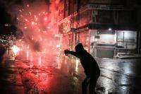 Kurdish millitant fires fireworks towards Turkish riot police