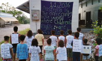 Children from the refugee and asylum seeker community on Nauru take part in a protest against continuing detention and Australia’s immigration policies