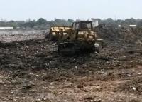 Earth works at Bakoteh dumpsite