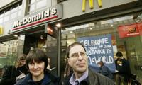 The McLibel two: Helen Steel and David Morris, outside a branch of McDonald's in London in 2005 after winning their case in the European court of human rights. Photograph: Martin Argles for the Guardian