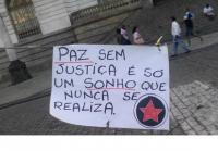 “peace without justice can only be a dream without getting real” a banner at the picket at camara square in november