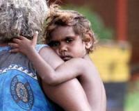 Aboriginal child with carer