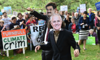 Protesters in Melbourne before an expected meeting there between Malcolm Turnbull and Gautam Adani, the head of the Indian mining company Adani.