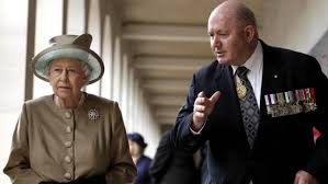 Cosgrove with Queen Elizabeth, whom he represents.jpg
